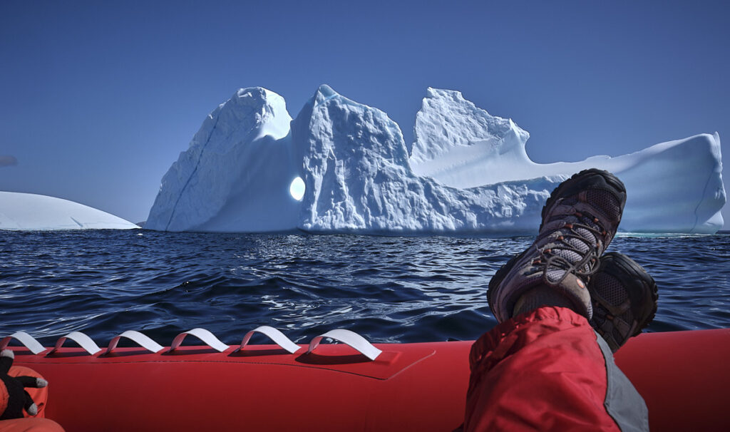 Photo: Relaxing watching the icebergs on a Kodiak tour by Dark Tickle Expeditions out of Dark Tickle, Newfoundland. Photo by Greg Locke